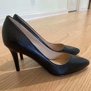 Black leather pumps